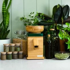 NutriMill Harvest Grain Mill | Forest Green + Cutting Board & Canister Bundle -Coffee & Espresso Elegant store greenharv1