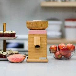 NutriMill Harvest Grain Mill | Pink + Cutting Board & Canister Bundle -Coffee & Espresso Elegant store pink1